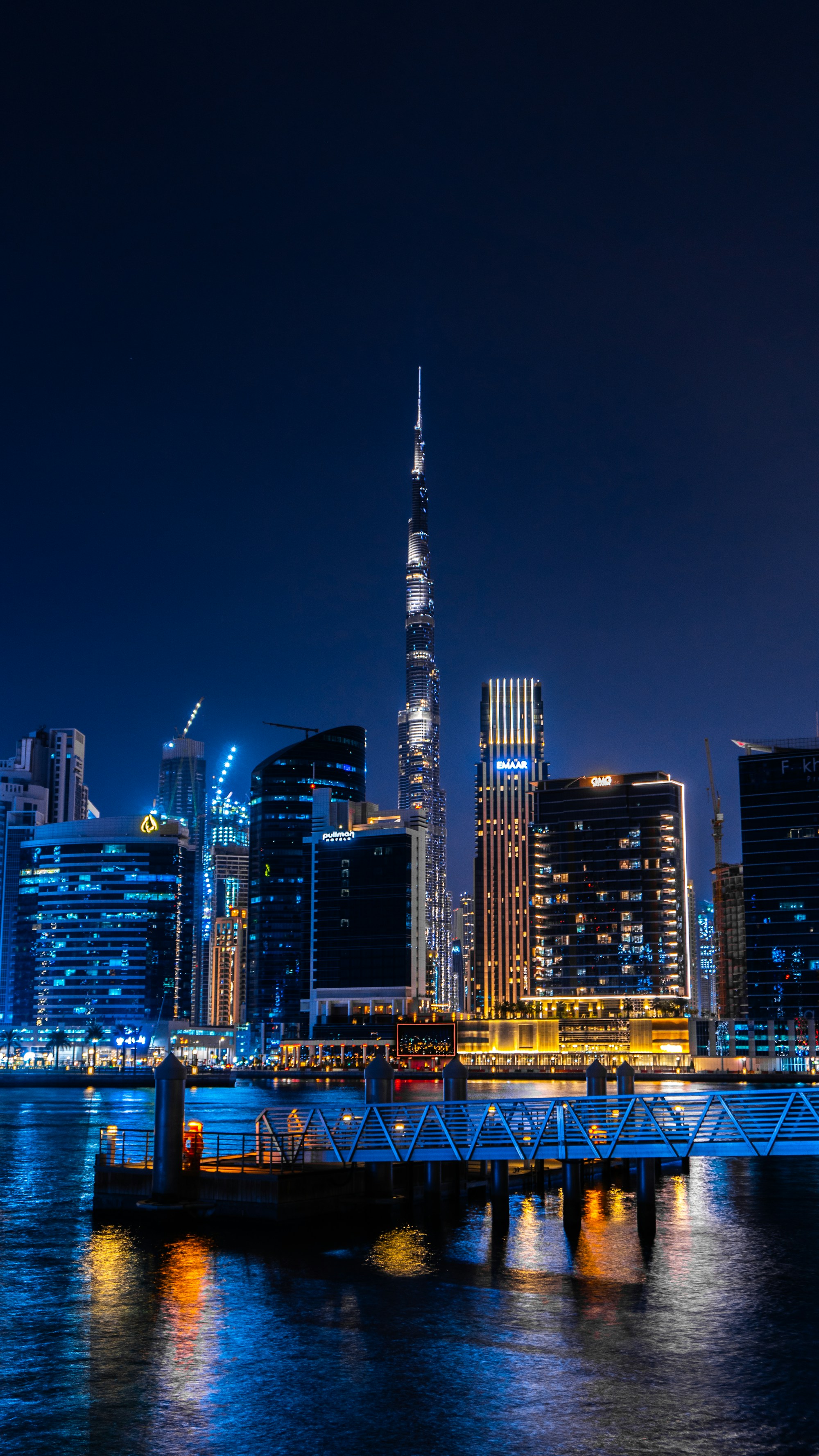 Global business district lit at night